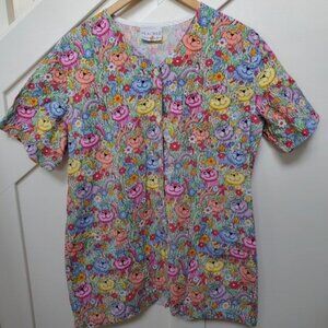 Vibrant and fun cats in grass front button up nurses top
